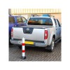 Heavy Duty Fold Down 900RW-110 Security Bollard (raised behind a vehicle).